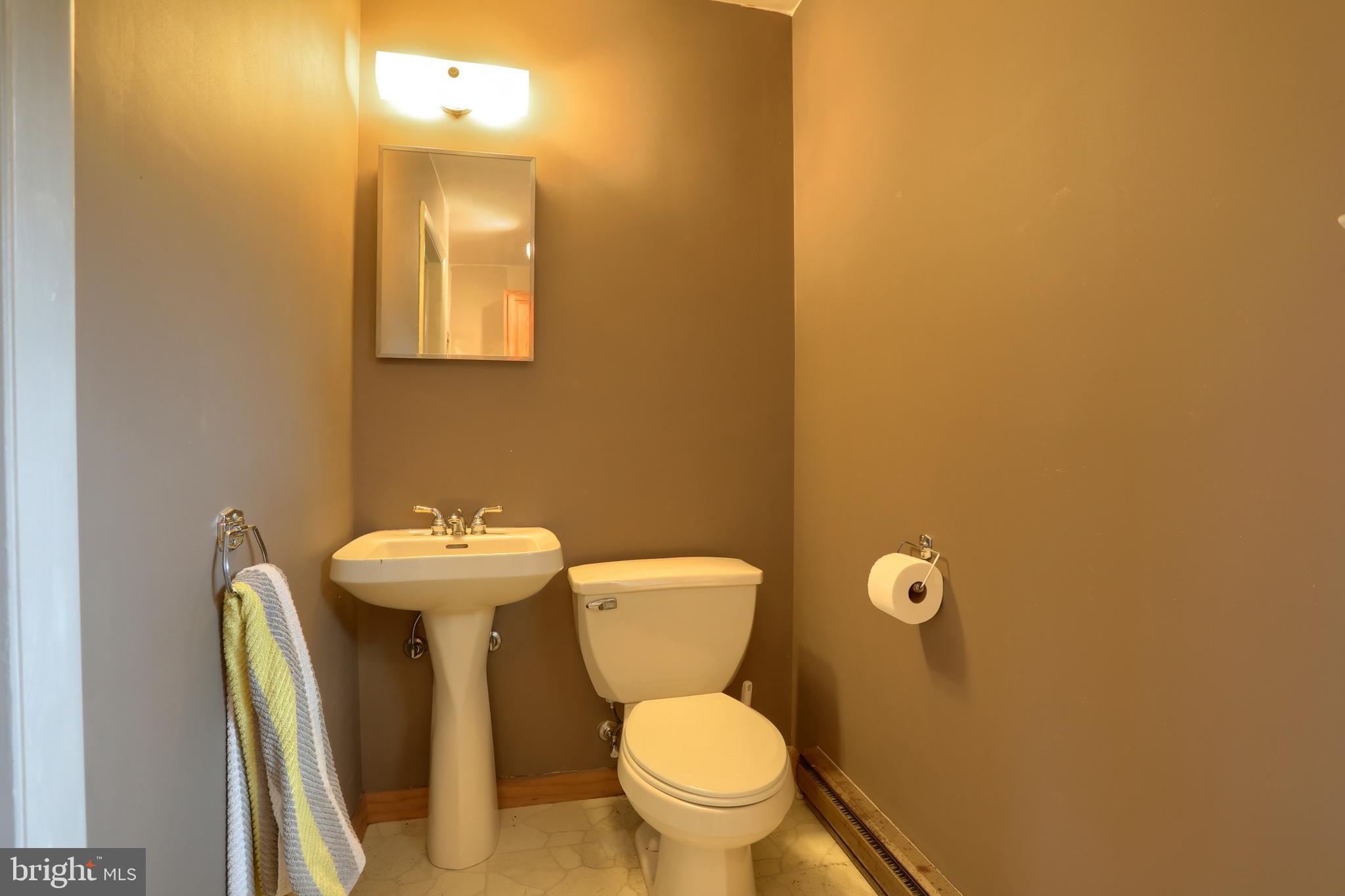 2040 Miller Road East Petersburg, PA 17520 - Photo 43 of 49 a white toilet sitting next to a bathroom sink