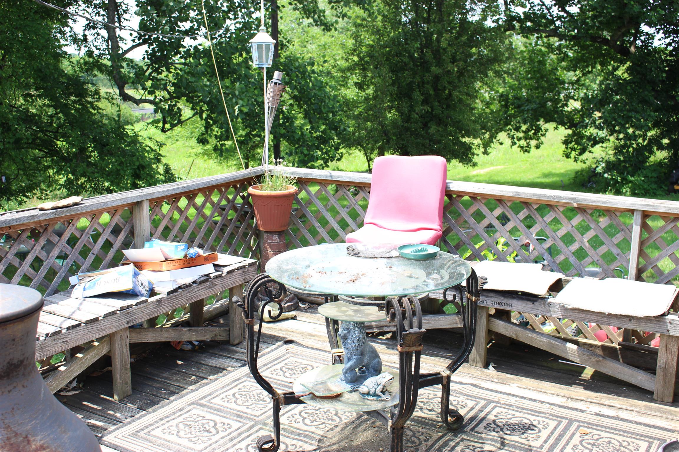 3676 Dobbin Road Springfield, TN 37172 - Photo 5 of 9 a balcony with wooden floor table and chairs