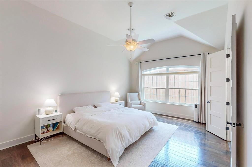 9964 Madrone Drive Frisco, TX 75033 - Photo 17 of 39 a spacious bedroom with a bed and a window