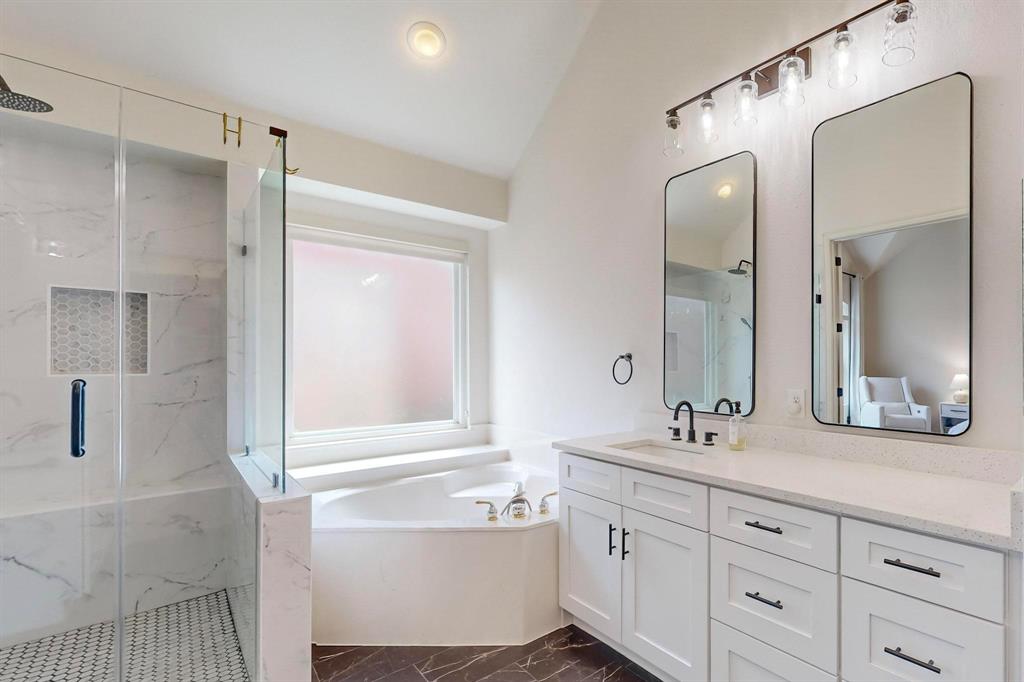 9964 Madrone Drive Frisco, TX 75033 - Photo 20 of 39 a bathroom with a double vanity sink mirror double and shower