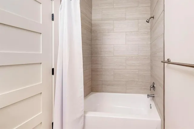 a bathroom with a bathtub