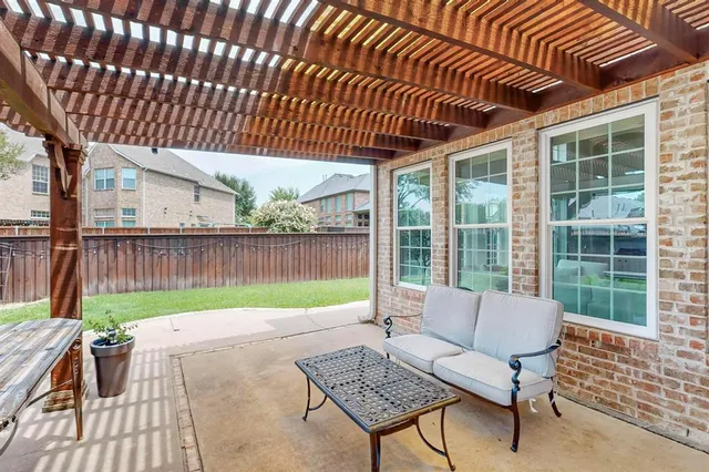 a garden view with a seating space