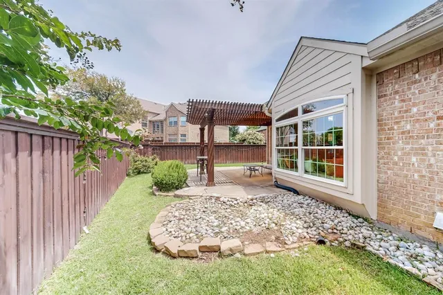 a house view with a garden space