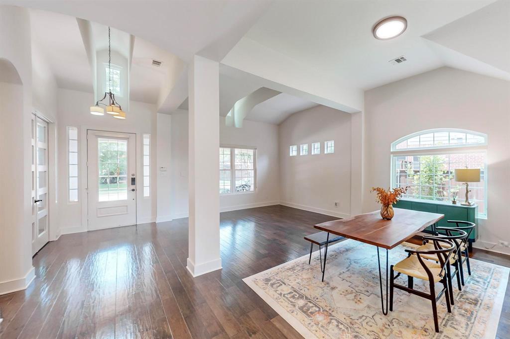 9964 Madrone Drive Frisco, TX 75033 - Photo 7 of 39 a view of a dining room with furniture and wooden floor