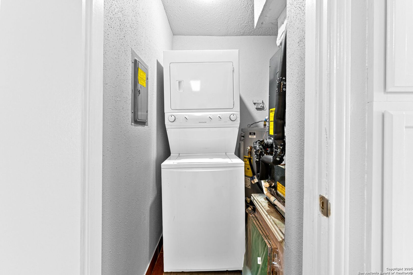 4949 Hamilton Wolfe Road, Unit 8104 San Antonio, TX 78229 - Photo 18 of 27 a utility room with dryer and washer