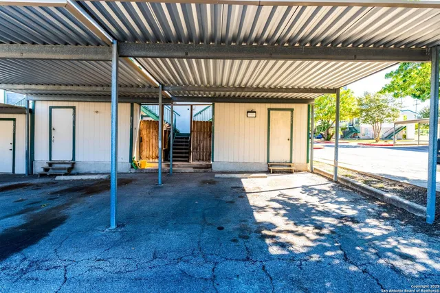 a view of a porch of a house