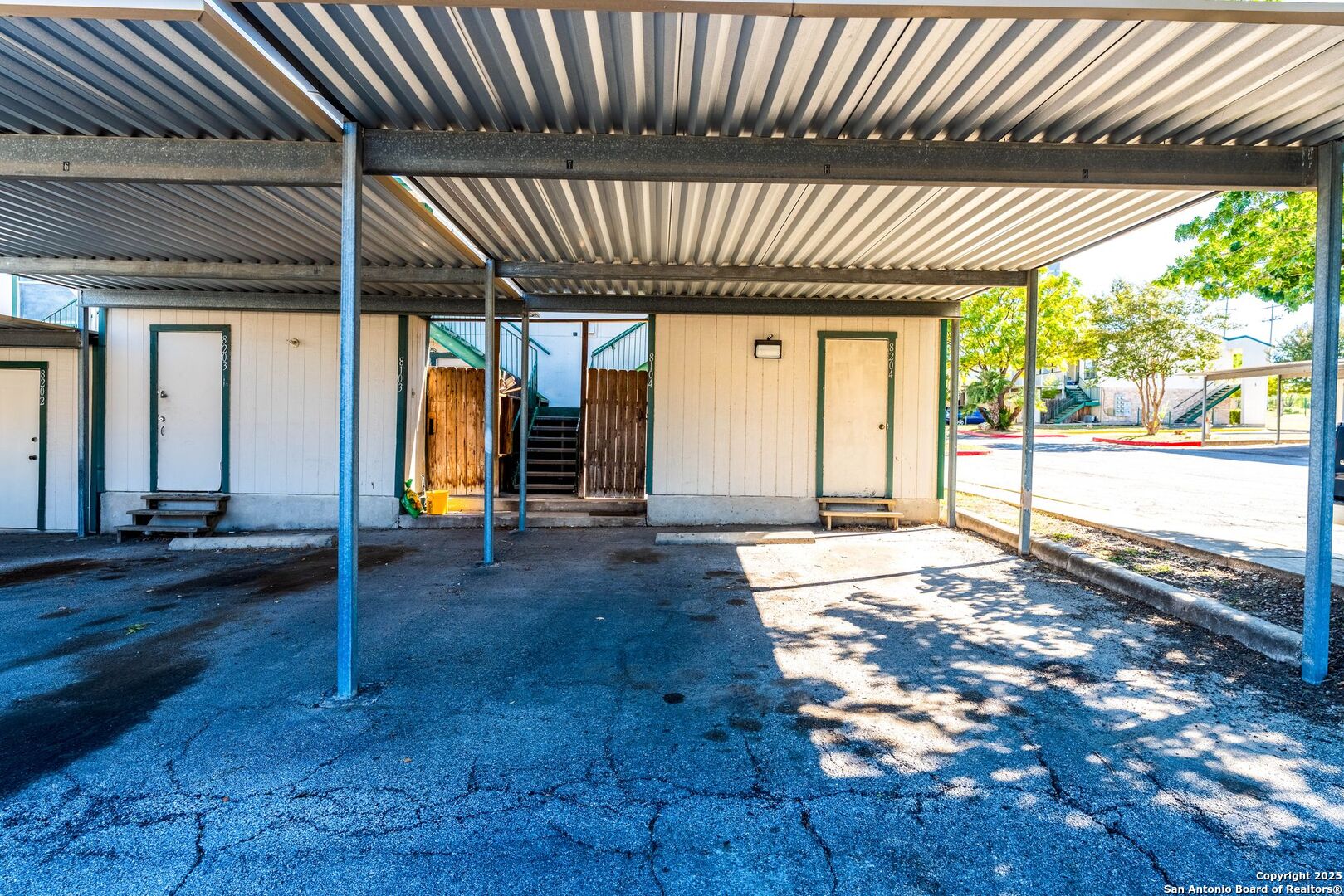 4949 Hamilton Wolfe Road, Unit 8104 San Antonio, TX 78229 - Photo 23 of 27 a view of a porch of a house