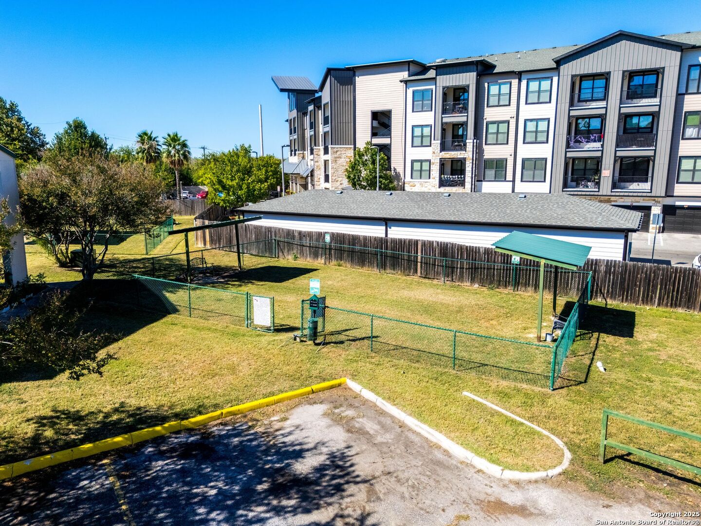 4949 Hamilton Wolfe Road, Unit 8104 San Antonio, TX 78229 - Photo 24 of 27 a view of a swimming pool with outdoor seating