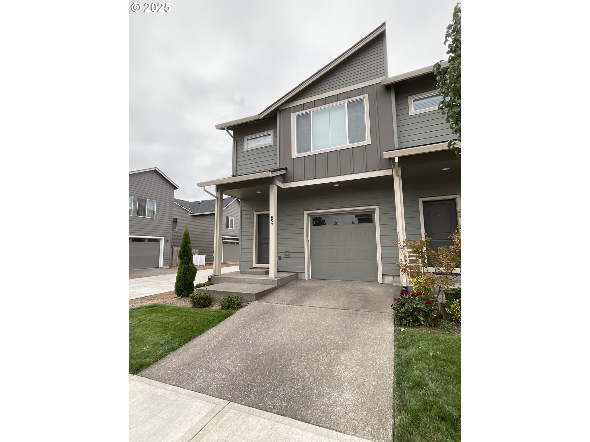 857 South 25th Avenue Cornelius, OR 97113 - Photo 3 of 22 a front view of a house with a yard