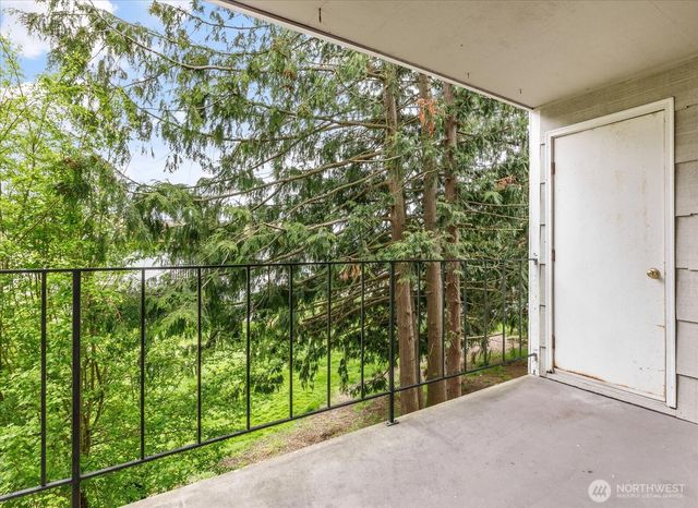 a view of a garden from a balcony