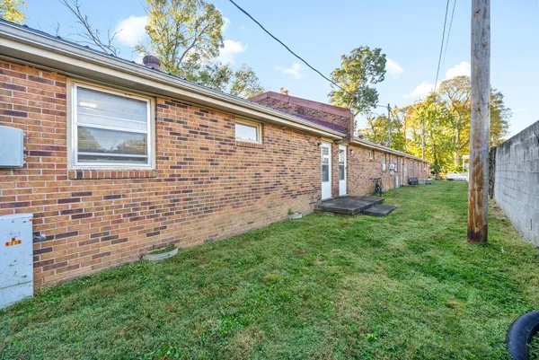 a view of a back yard of the house