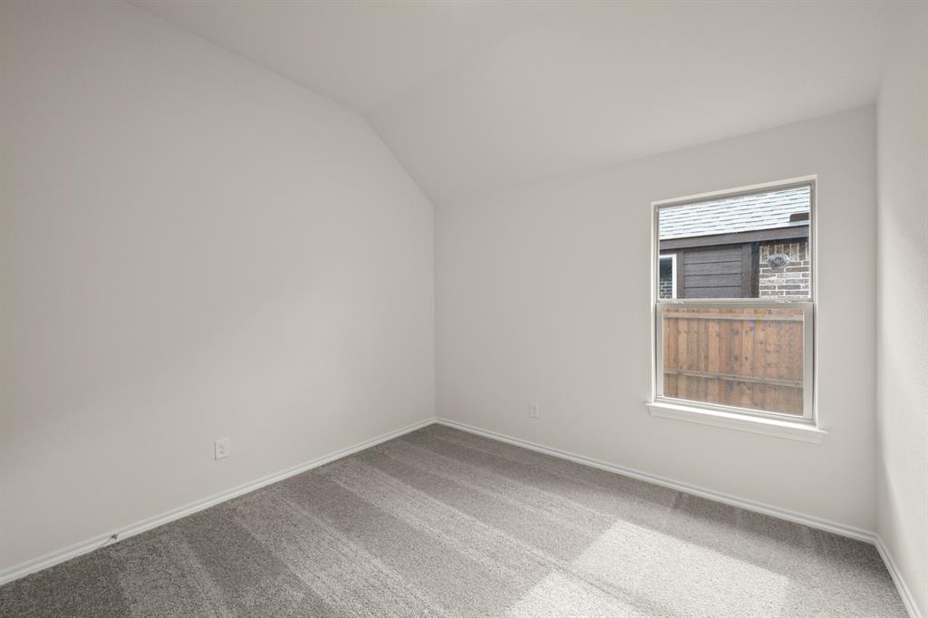 10809 Rothland Street Crowley, TX 76036 - Photo 18 of 30 an empty room with a window