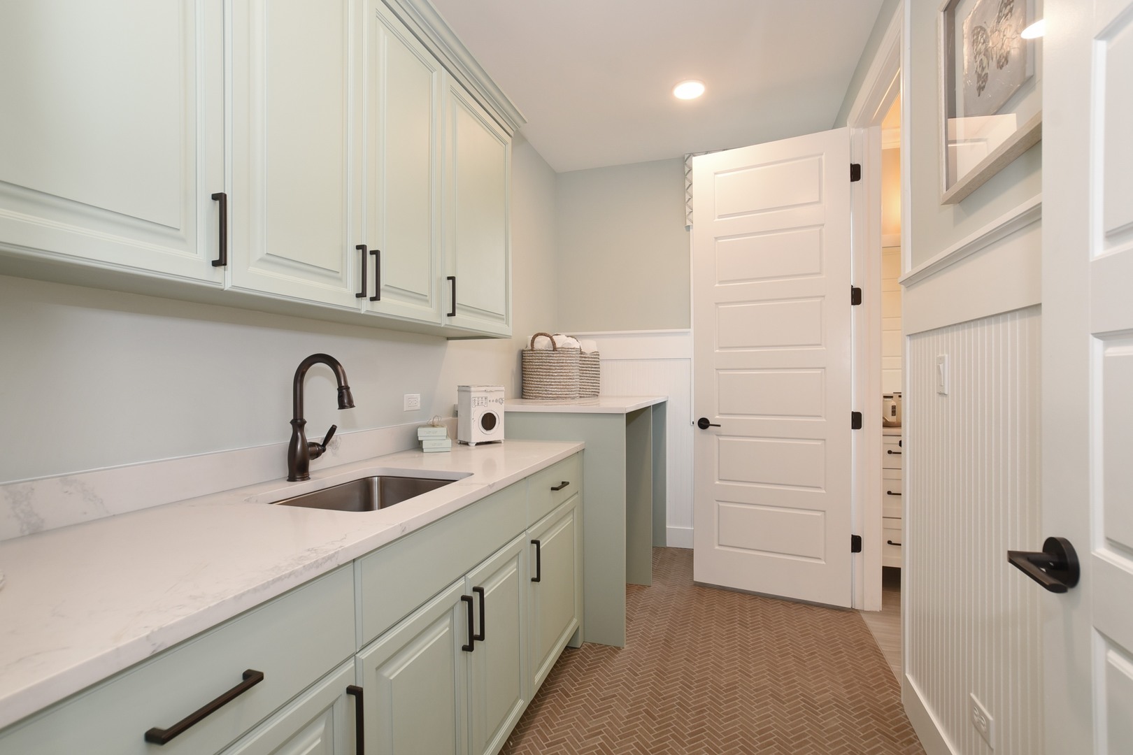 180 Orchard Circle Lake Forest, IL 60045 - Photo 9 of 15 a kitchen with white cabinets and sink