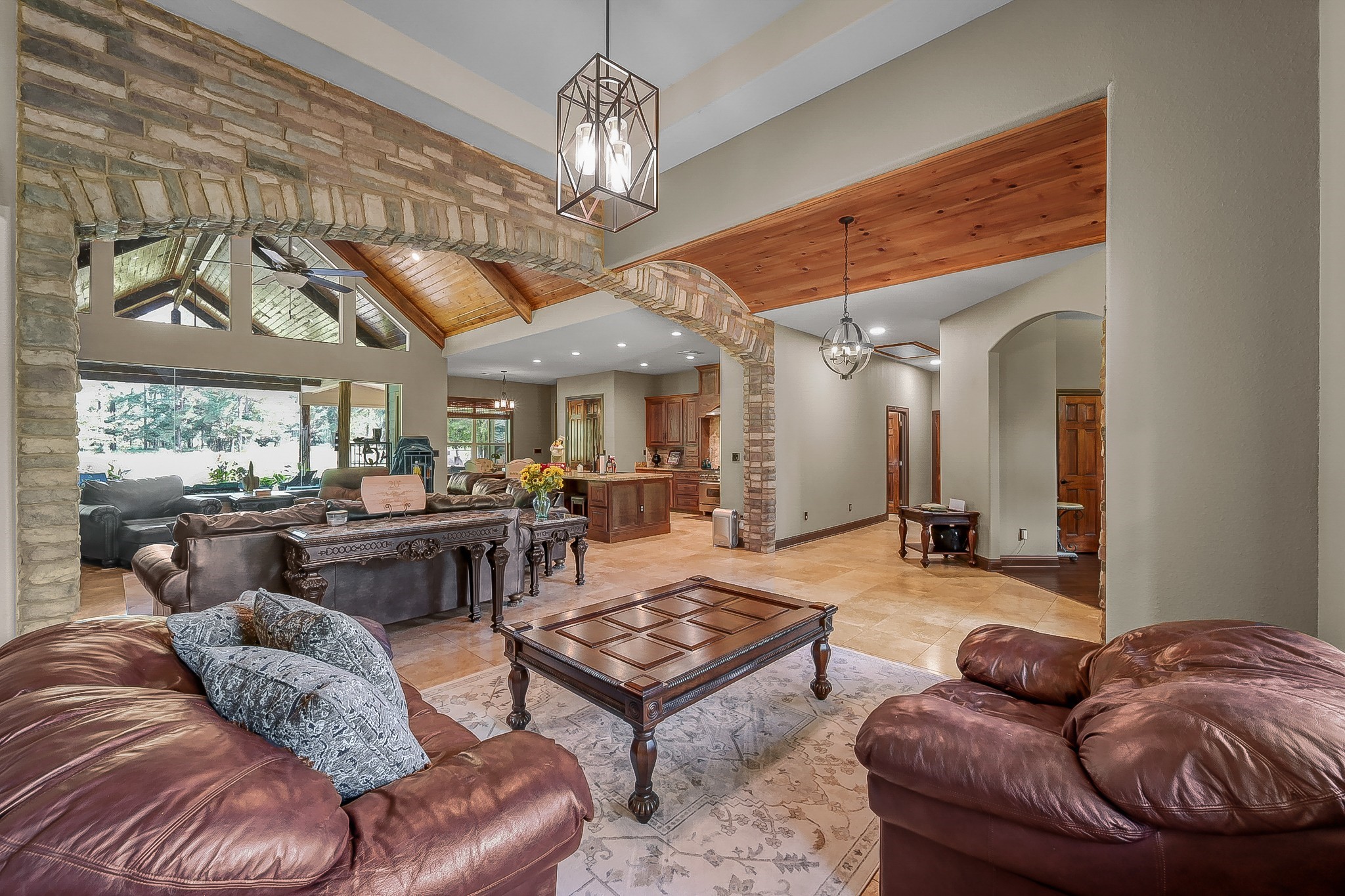 1183 Jones Road New Waverly, TX 77358 - Photo 11 of 40 a living room with furniture chandelier and a chandelier