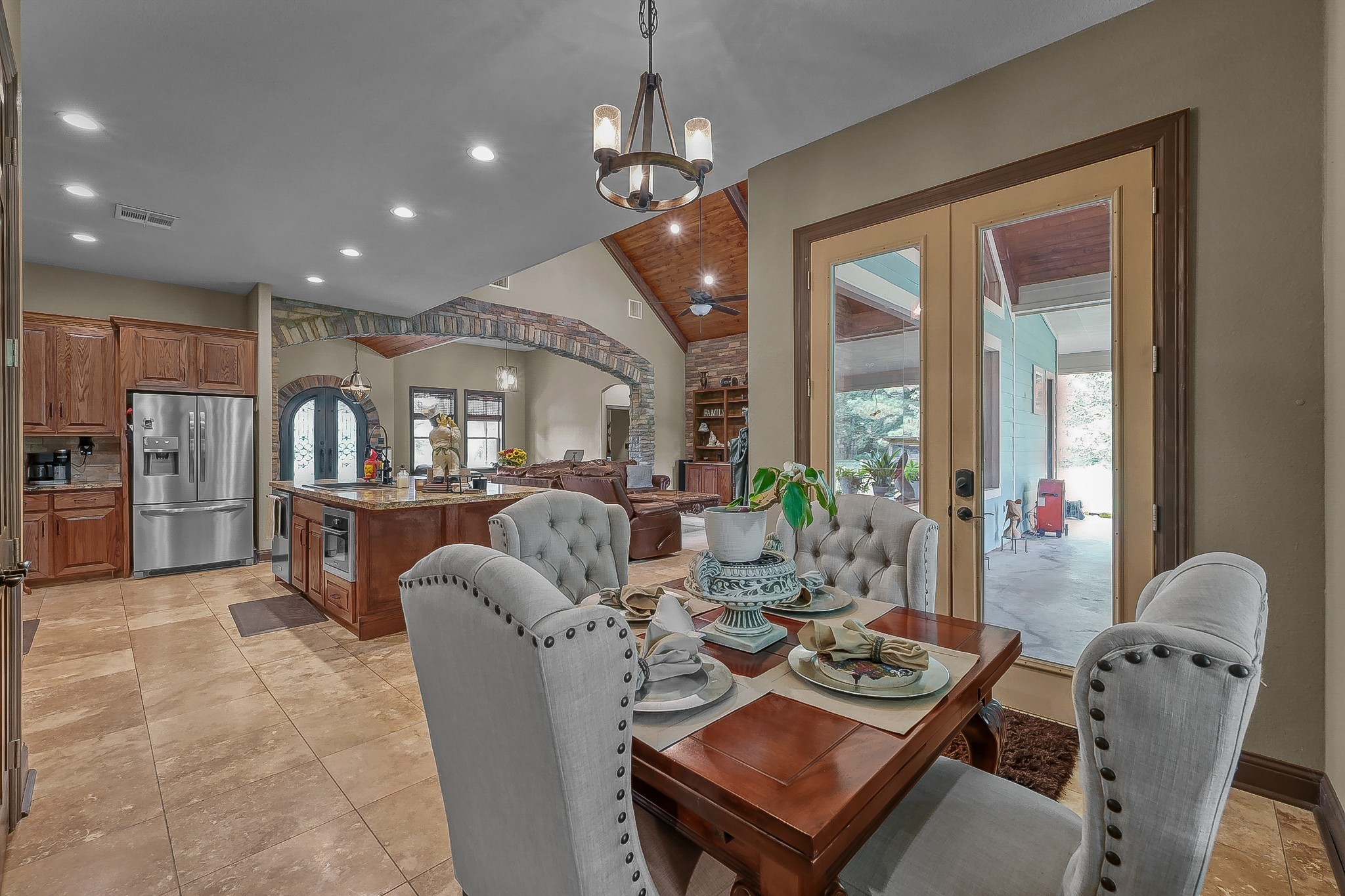 1183 Jones Road New Waverly, TX 77358 - Photo 19 of 40 a living room with furniture and a chandelier