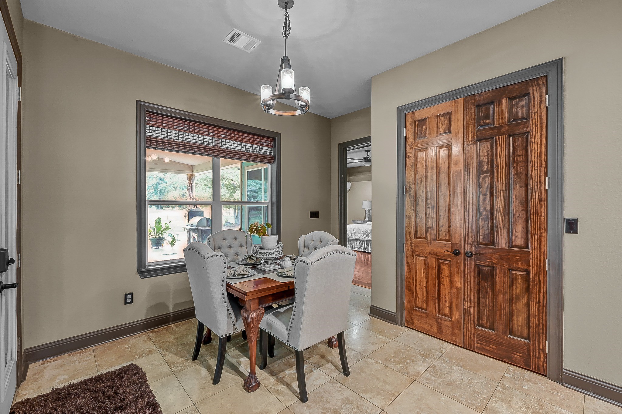 1183 Jones Road New Waverly, TX 77358 - Photo 20 of 40 a view of a dining room with furniture window and outside view