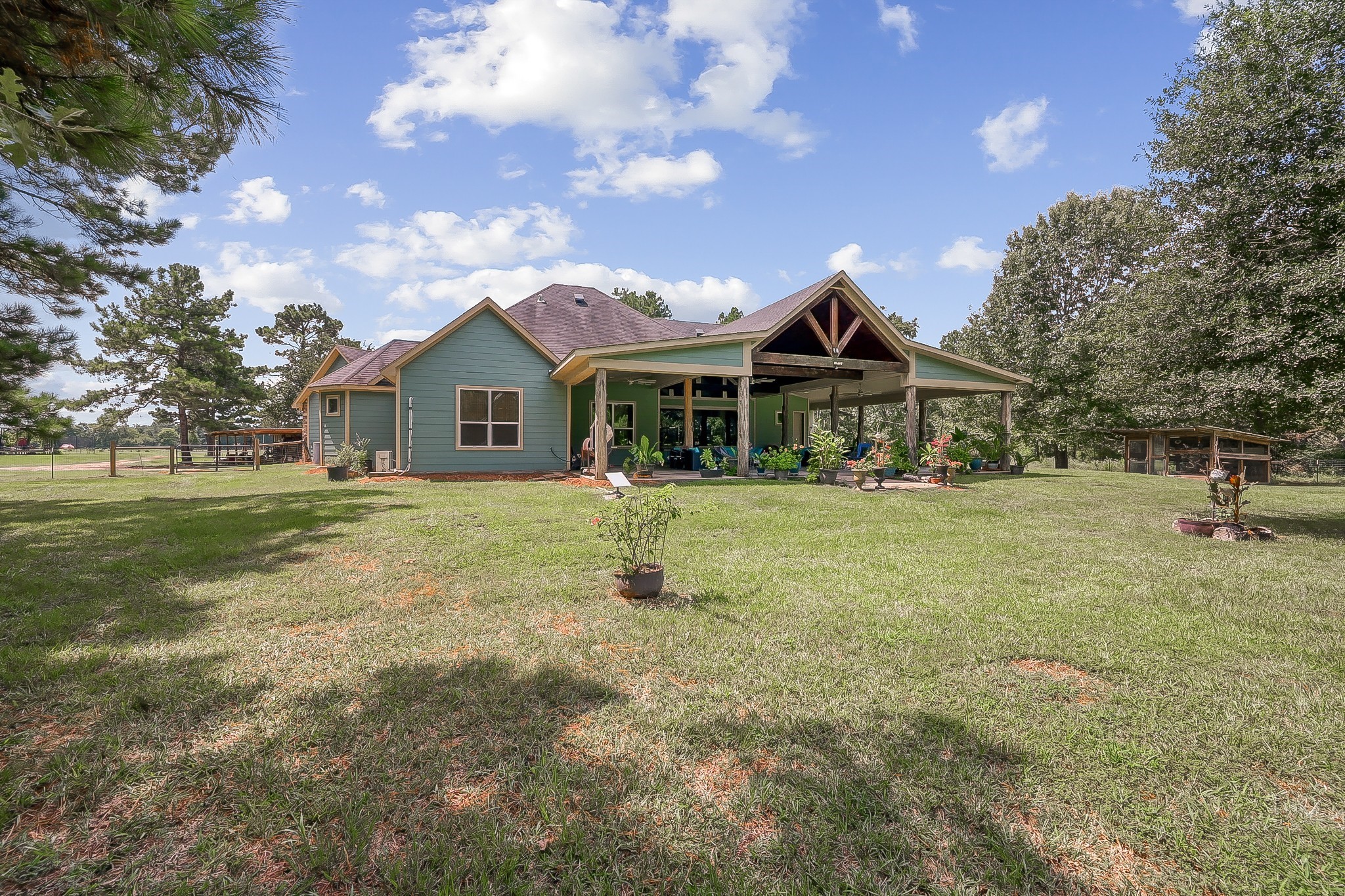 1183 Jones Road New Waverly, TX 77358 - Photo 36 of 40 a front view of a house with a yard