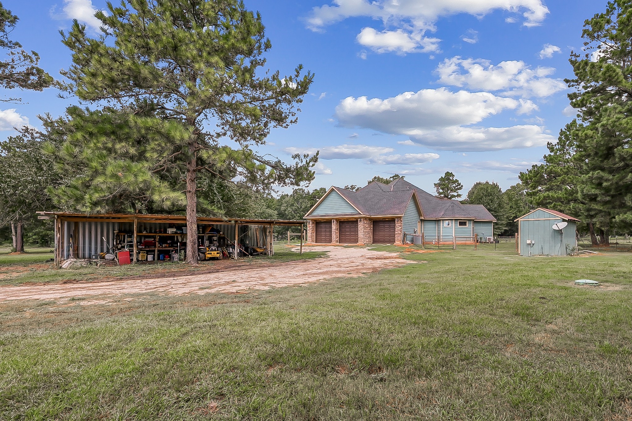 1183 Jones Road New Waverly, TX 77358 - Photo 37 of 40 a front view of a house with a yard