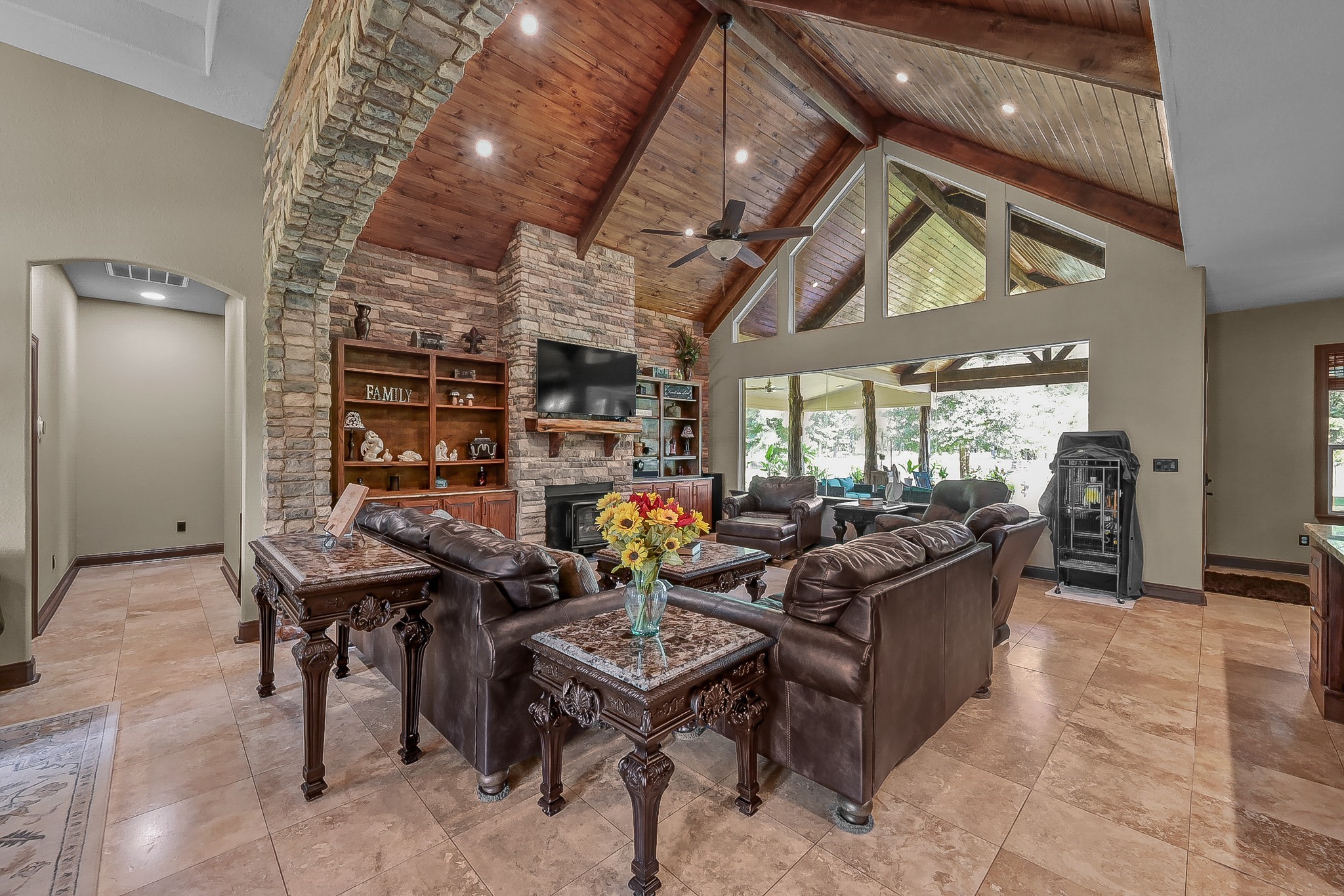 1183 Jones Road New Waverly, TX 77358 - Photo 6 of 40 a living room with lots of furniture and a large window
