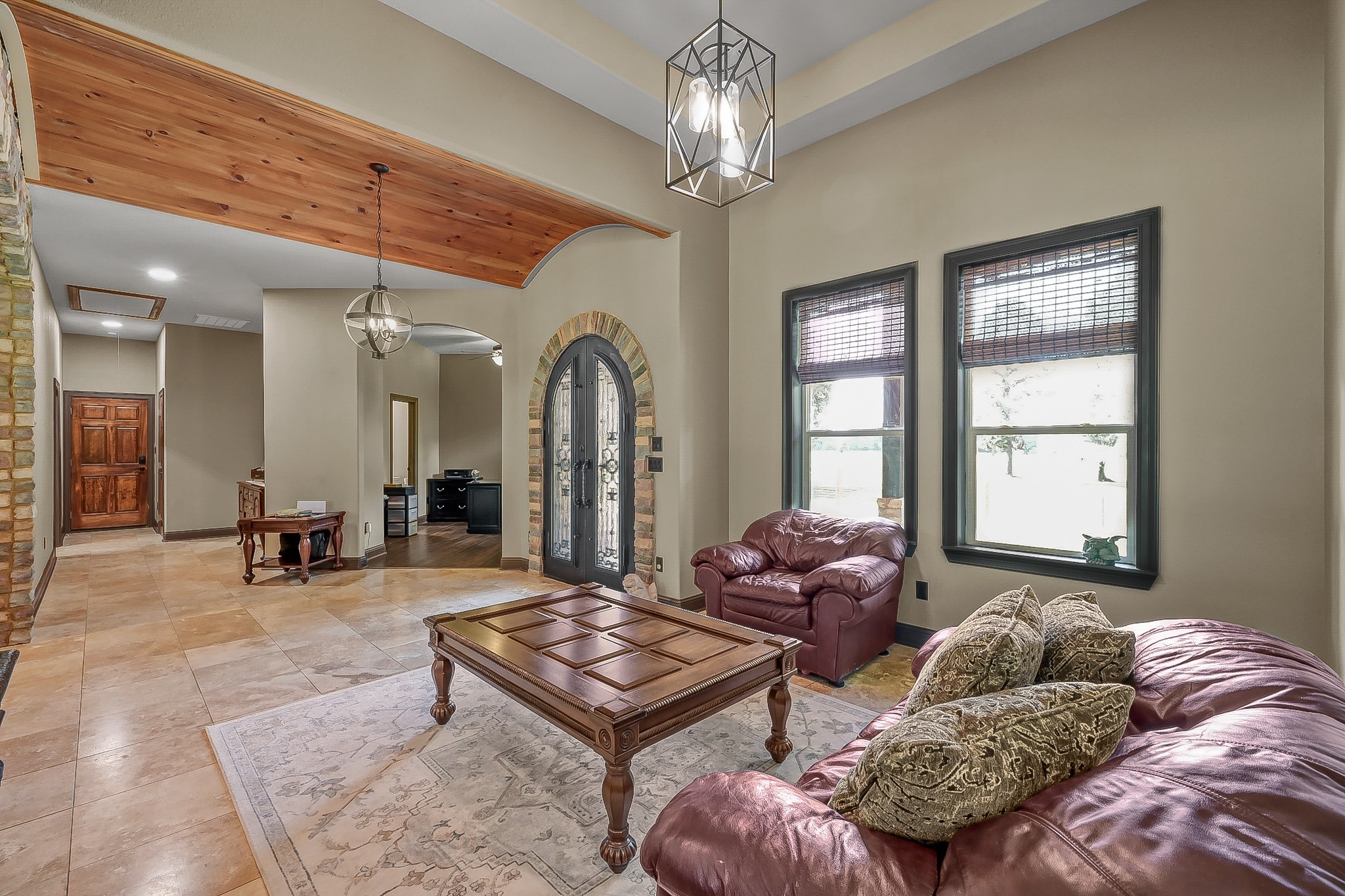 1183 Jones Road New Waverly, TX 77358 - Photo 7 of 40 a living room with furniture and a chandelier