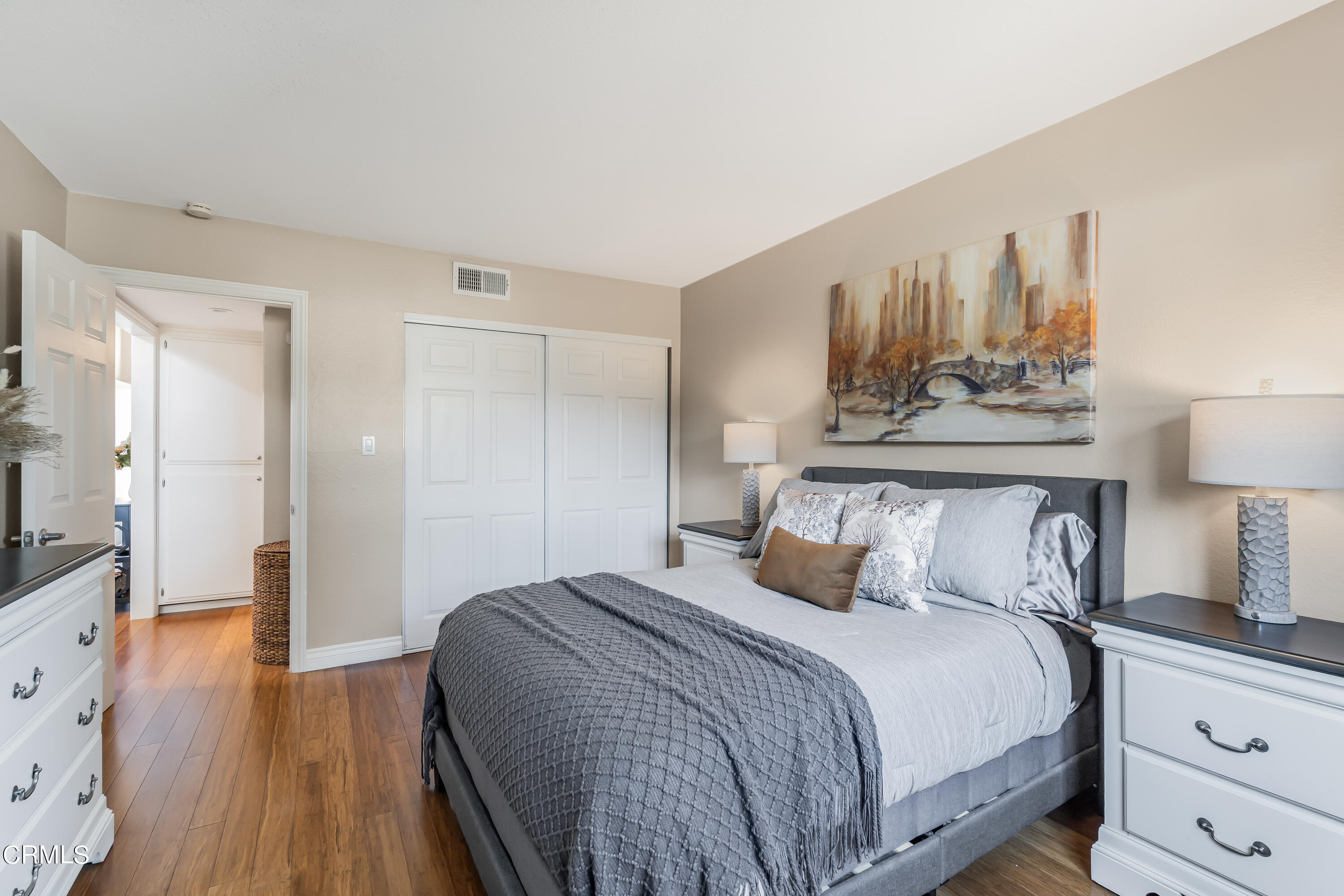 6392 Katherine Road, Unit B Simi Valley, CA 93063 - Photo 12 of 26 a bedroom with a bed and wooden floor