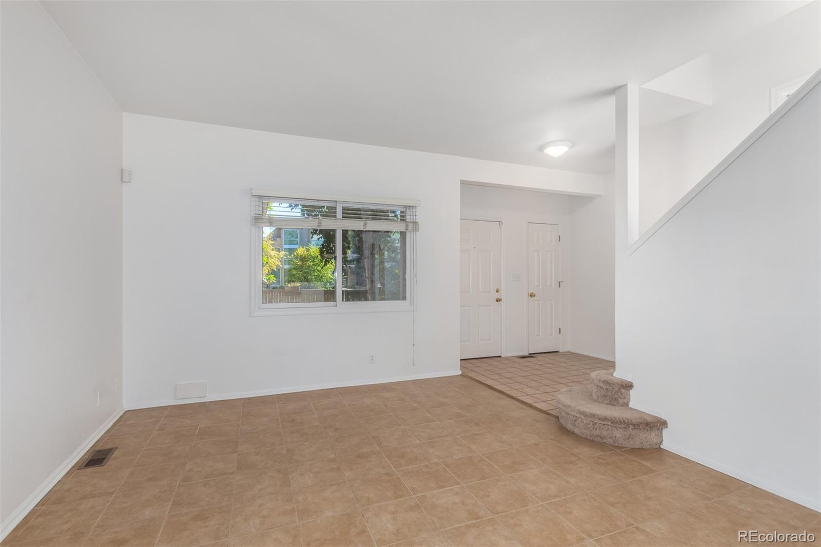 515 Cook Street Denver, CO 80206 - Photo 13 of 40 an empty room with windows