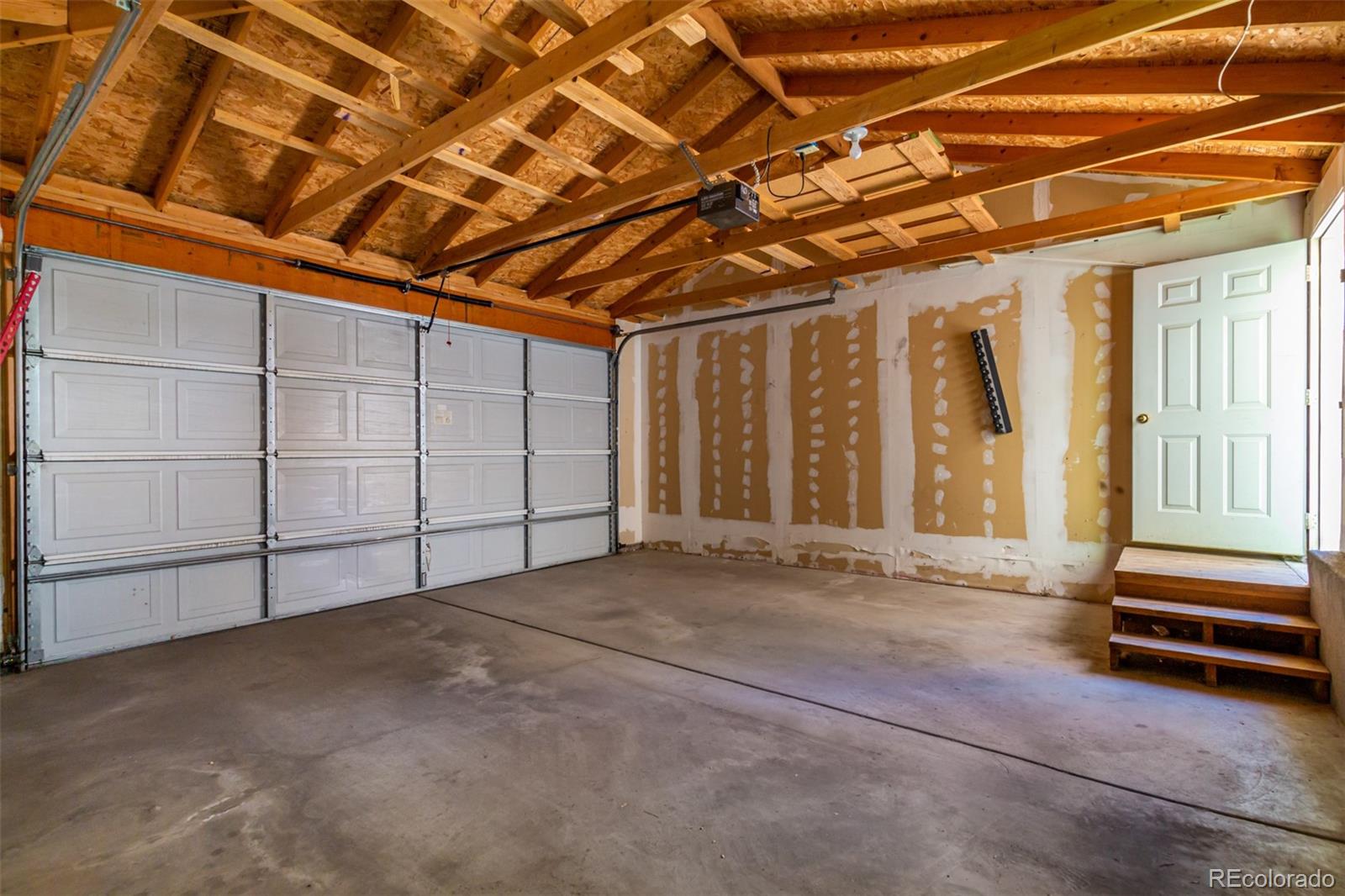 515 Cook Street Denver, CO 80206 - Photo 35 of 40 a view of empty room with wooden ceiling fan