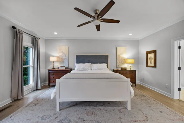 a bedroom with a bed and a view of bathroom