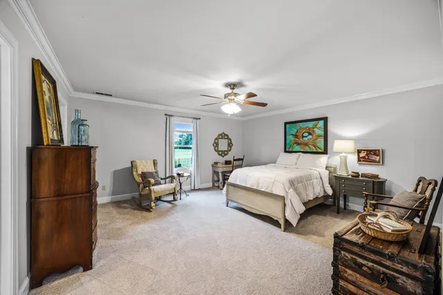 a bed room with a bed and furniture