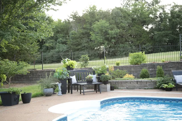 a view of a tables and chairs in patio