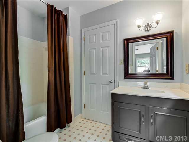 2717 High Ridge Road Charlotte, NC 28270 - Photo 11 of 16 a bathroom with a sink and a mirror