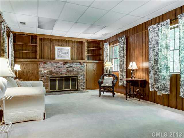 2717 High Ridge Road Charlotte, NC 28270 - Photo 13 of 16 a living room with furniture and a fireplace