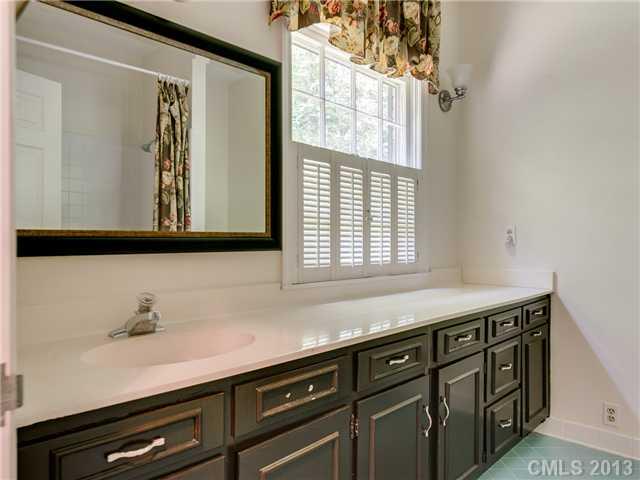 2717 High Ridge Road Charlotte, NC 28270 - Photo 9 of 16 a kitchen with a sink and cabinets