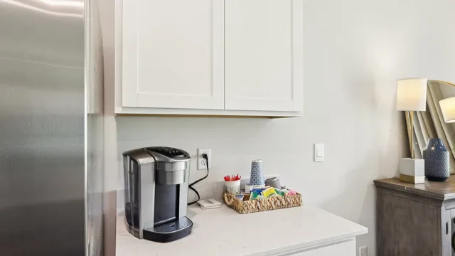a bathroom with a sink and vanity