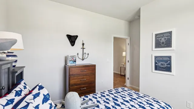 a bedroom with a bed and furniture