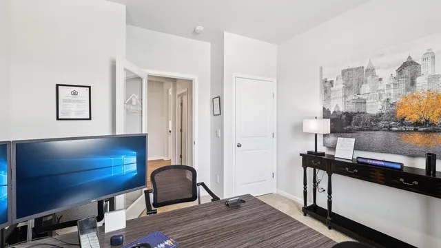 a room with cabinets and wooden floor