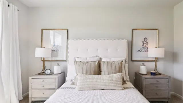 a living room with furniture and a lamp