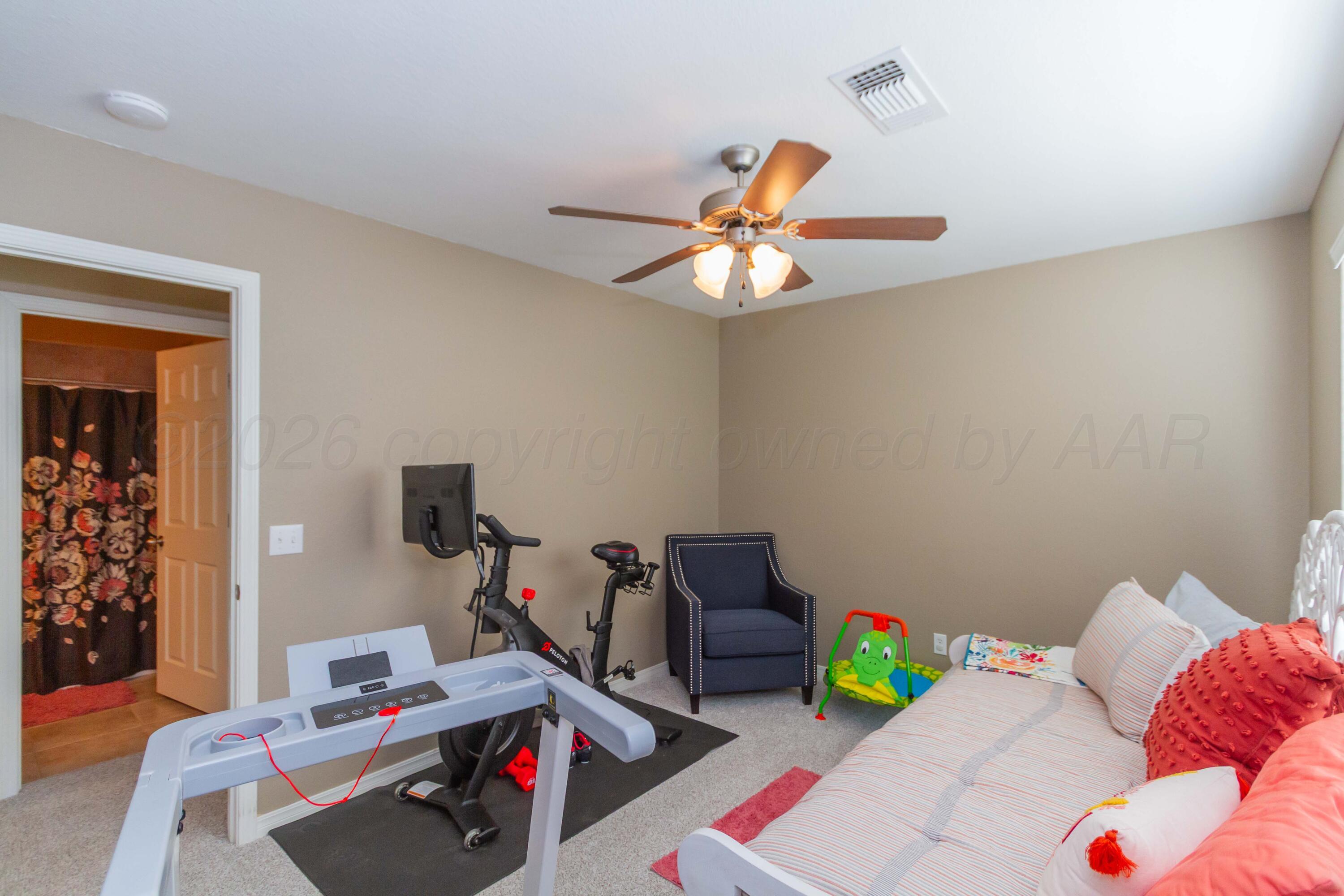 2802 Steve's Way Amarillo, TX 79118 - Photo 23 of 30 a view of a workspace with furniture and toys