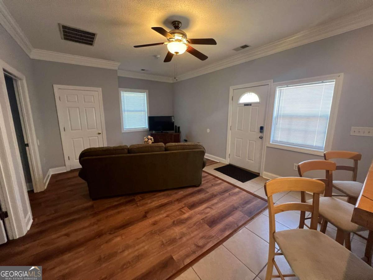 285 Savannah Avenue Athens, GA 30601 - Photo 3 of 9 a living room with furniture and a window