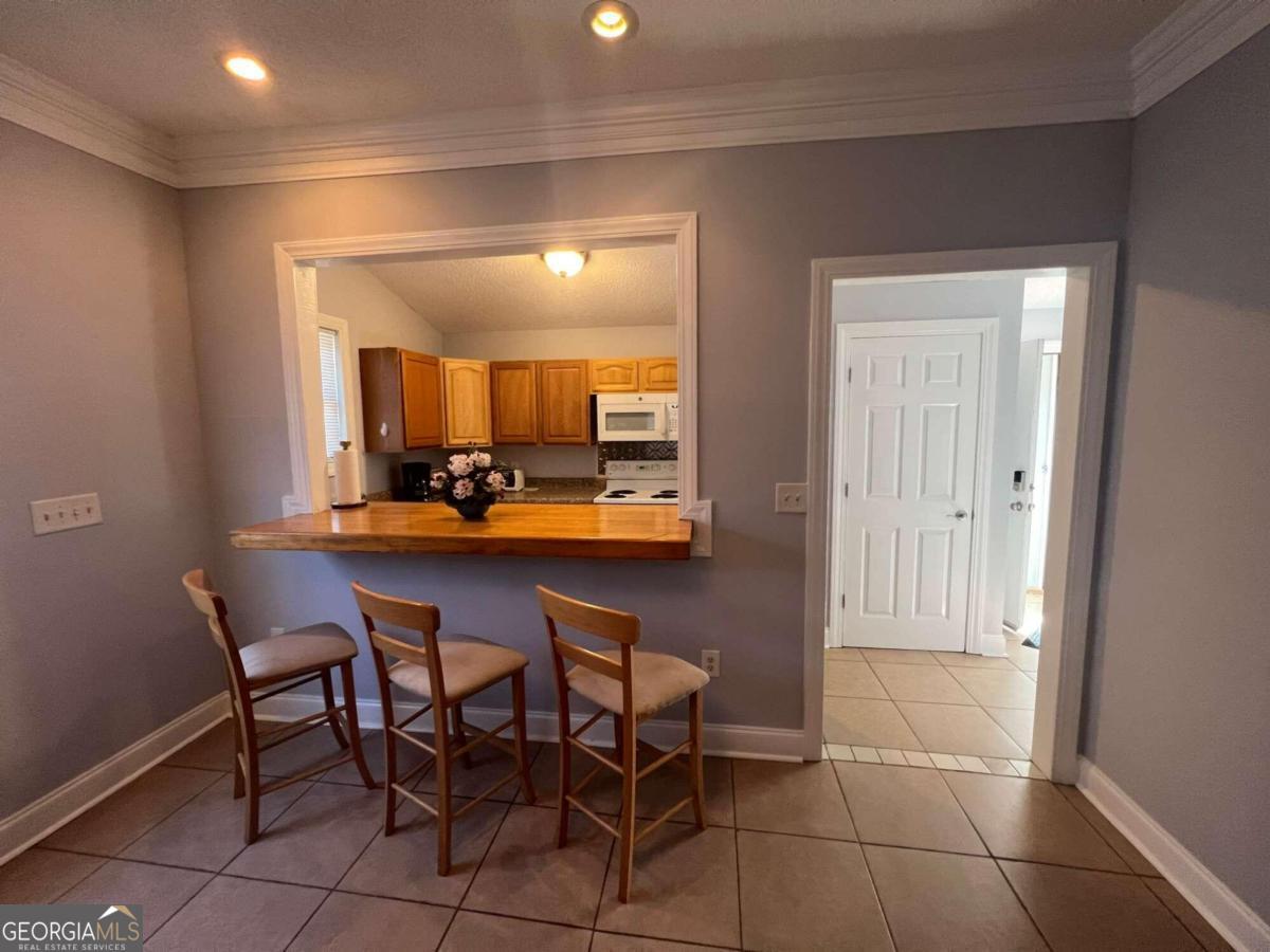 285 Savannah Avenue Athens, GA 30601 - Photo 4 of 9 a view of a dining room with furniture