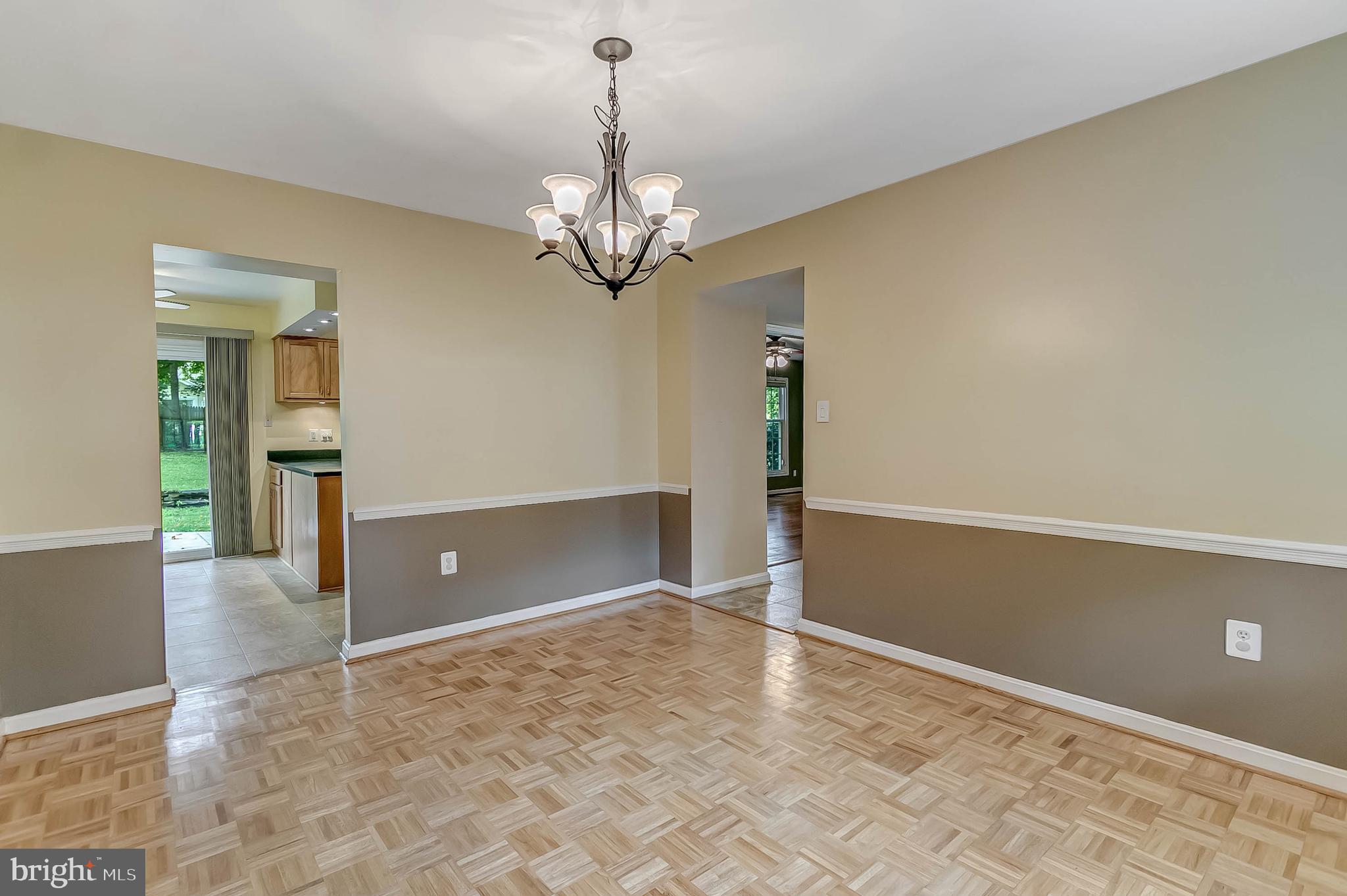 2908 Bluff Point Lane Silver Spring, MD 20906 - Photo 15 of 63 Formal dining room wit parquet floors