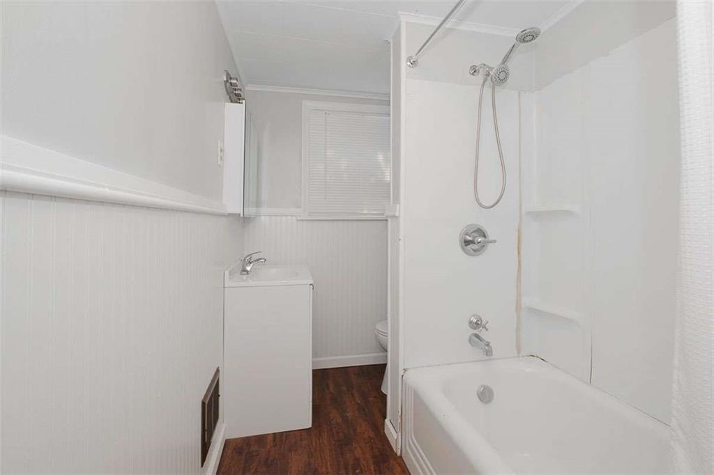 97 Royal Street Pittsburgh, PA 15212 - Photo 14 of 24 a bathroom with a bathtub and a shower