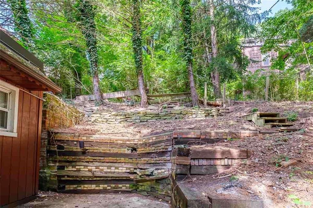97 Royal Street Pittsburgh, PA 15212 - Photo 23 of 24 a backyard of a house with barbeque oven