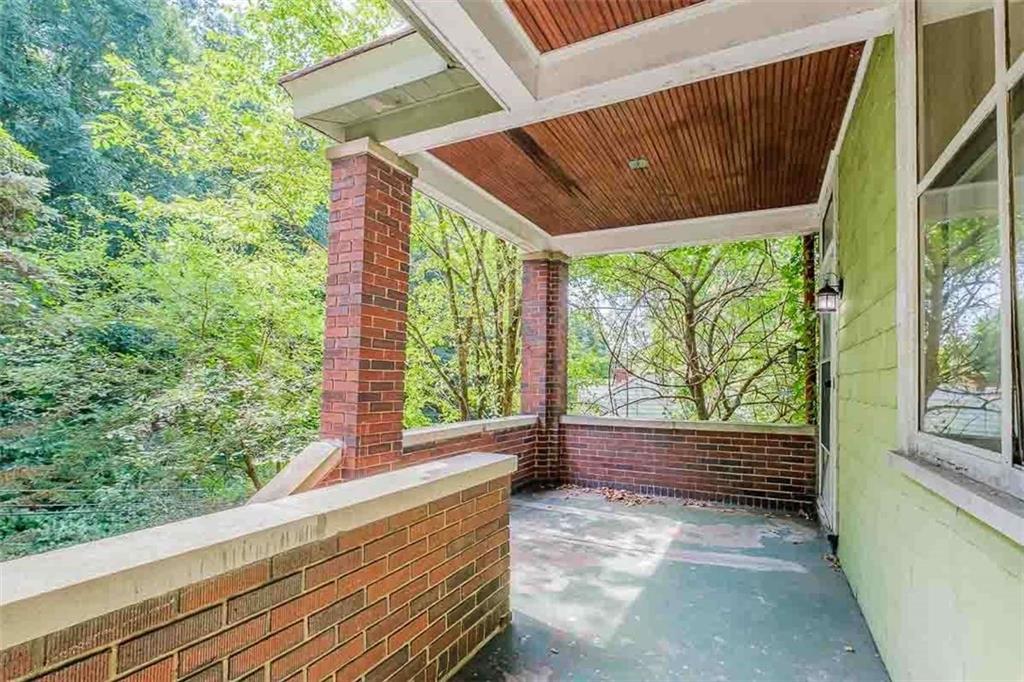 97 Royal Street Pittsburgh, PA 15212 - Photo 3 of 24 a view of a room that has a bed and a window