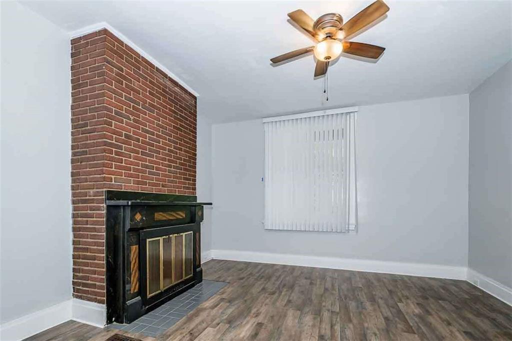 97 Royal Street Pittsburgh, PA 15212 - Photo 5 of 24 a view of livingroom with hardwood floor and a ceiling fan