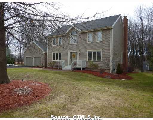 39 Devine Road Suffield, CT 06078 - Photo 1 of 1 Exterior Front. A Colonial with American-contemporary flair on a beautiful, level lot is the perfect place for your children, your pets, or just yourselves.