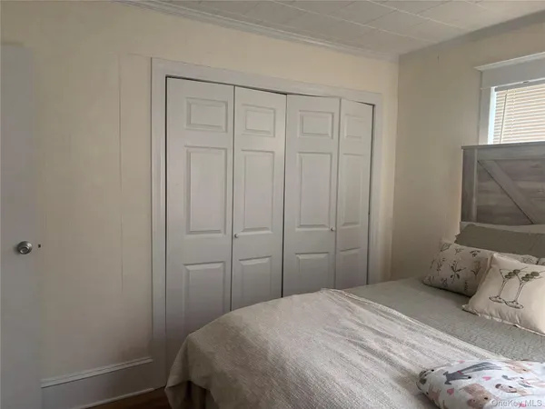 a view of room and front door