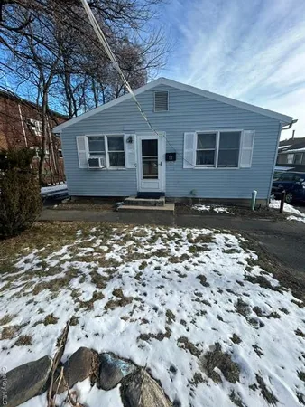 a view of a yard with a house