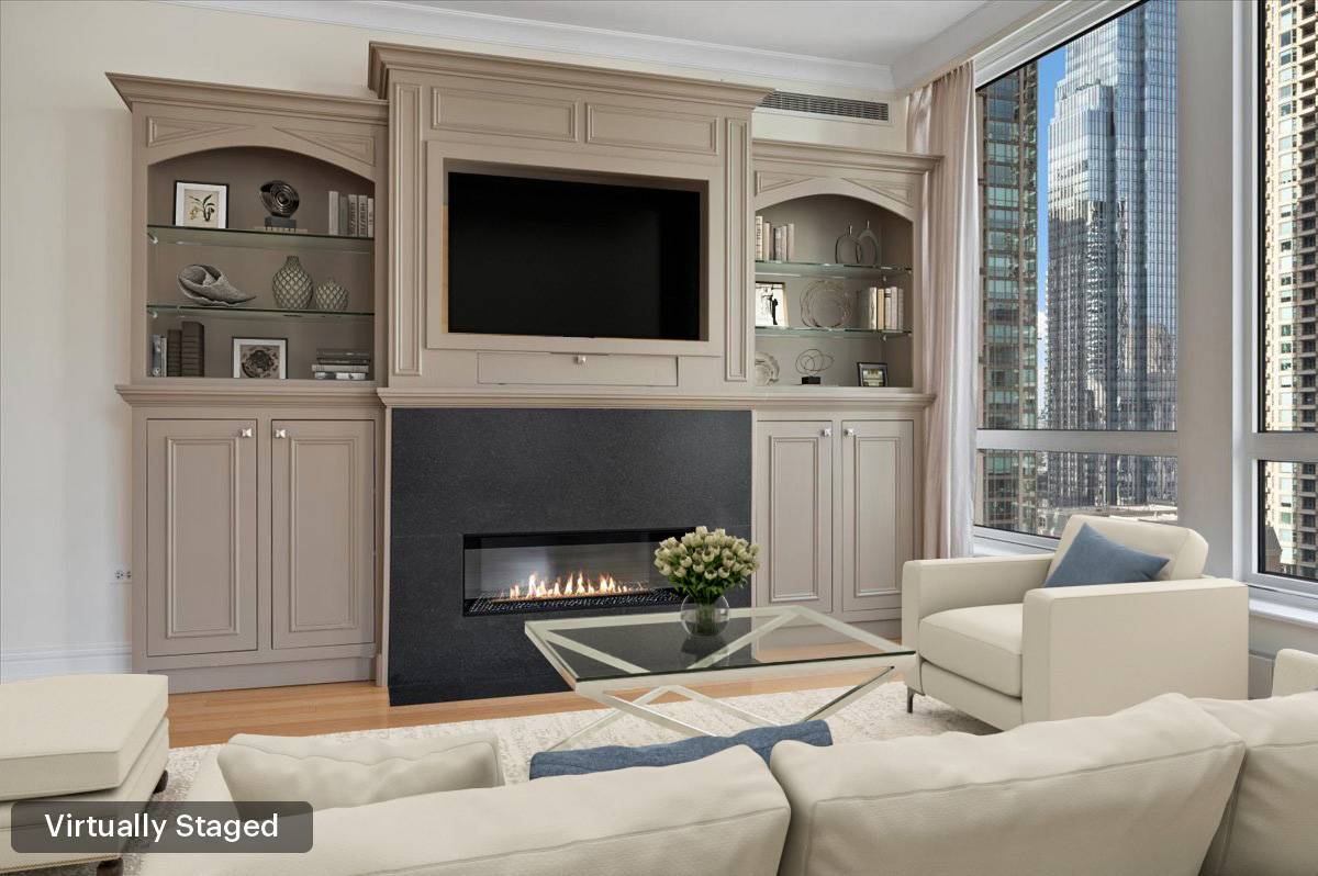 55 East Erie Street, Unit 1903 Chicago, IL 60611 - Photo 12 of 39 a living room with furniture and a fireplace