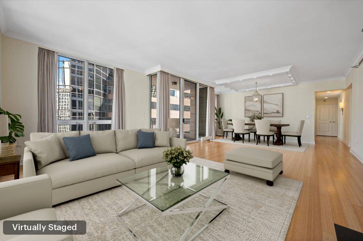 55 East Erie Street, Unit 1903 Chicago, IL 60611 - Photo 14 of 39 a living room with furniture and wooden floor